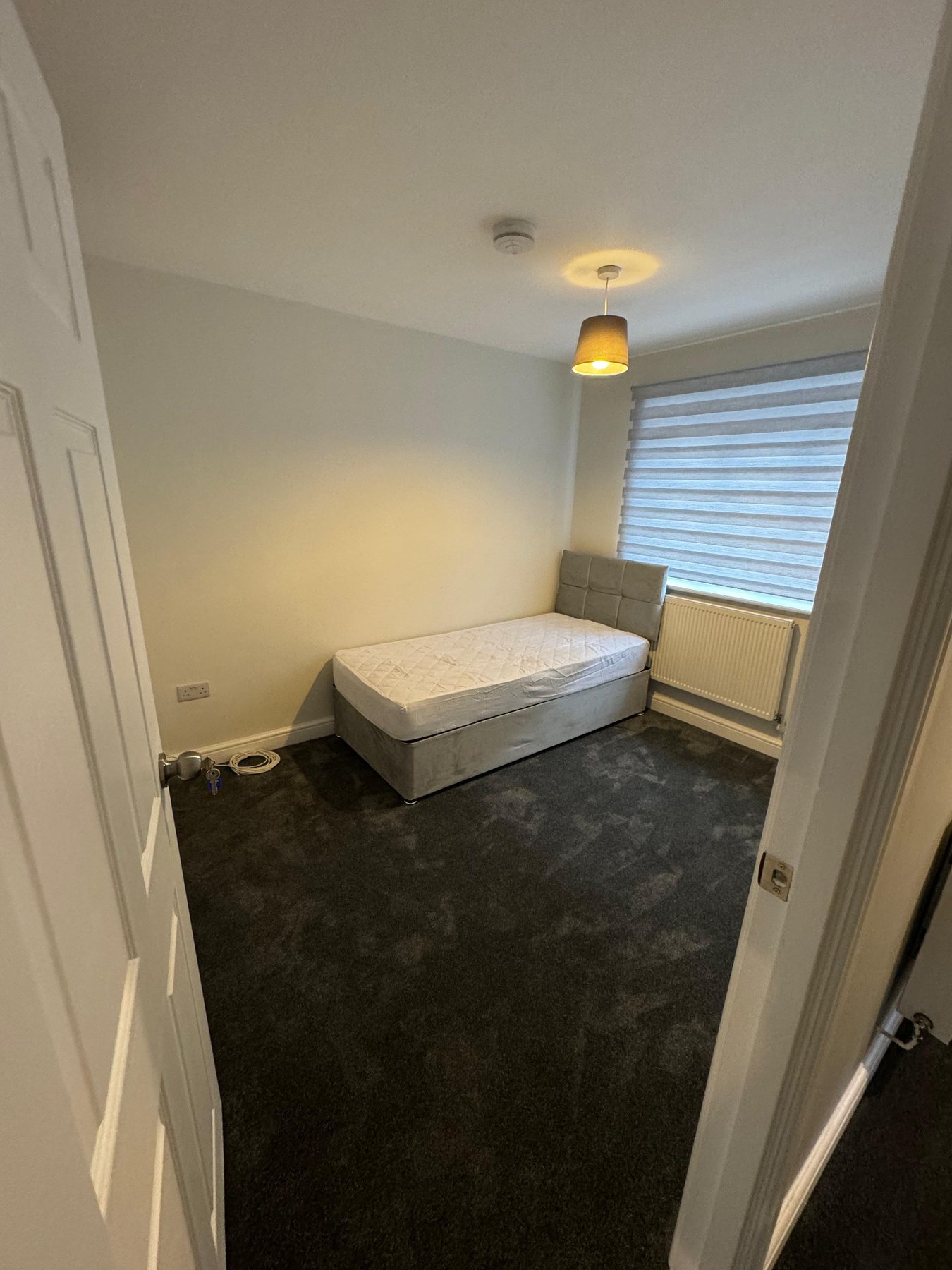 Simple furnished rental bedroom