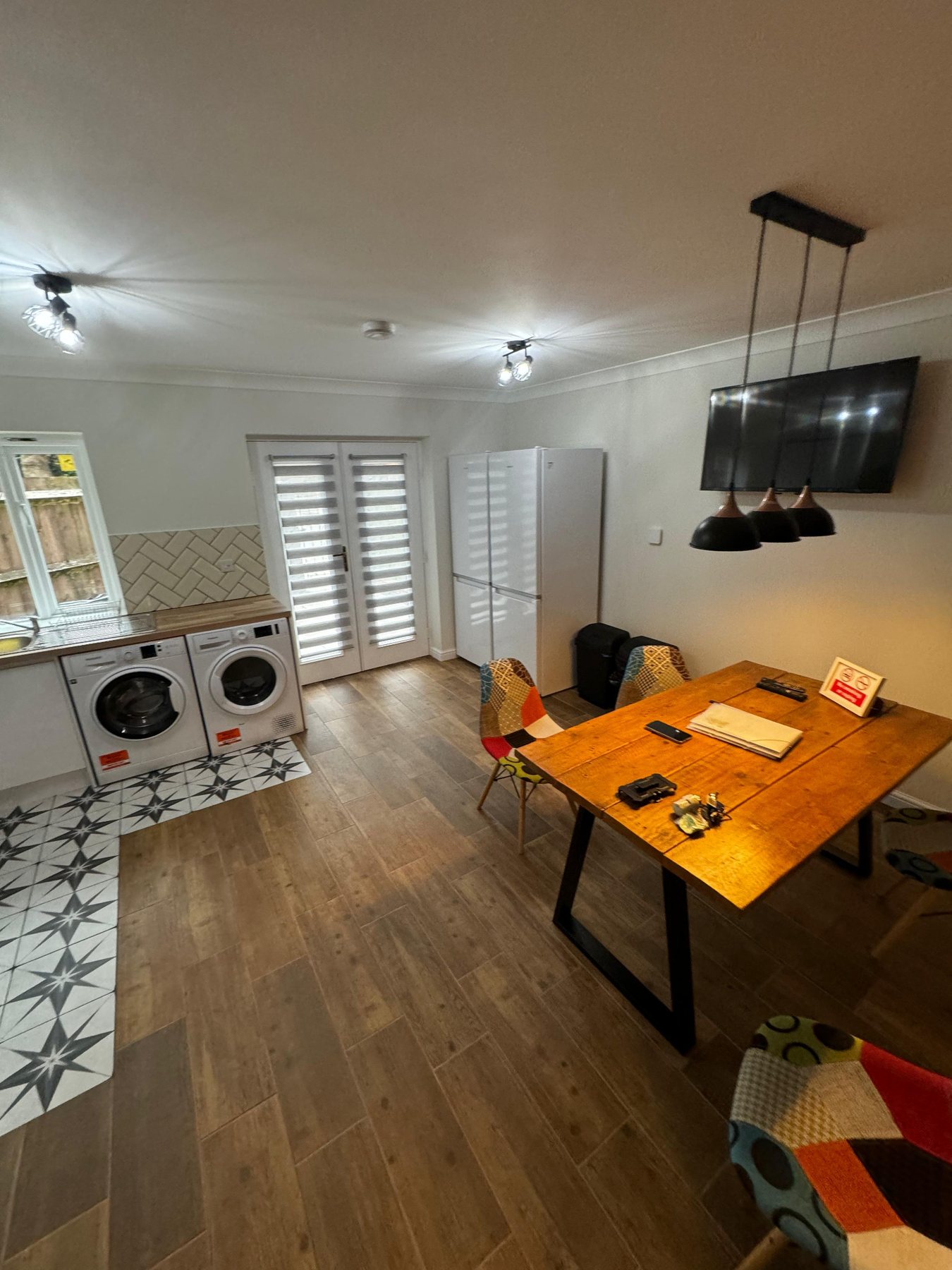Kitchen and laundry area in rental property